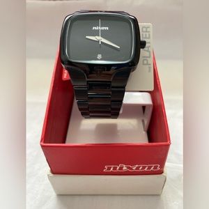Nixon brand watch, Model: “Player” All black with a real diamond. New condition.